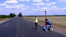 Влаштування верхнього шару асфальтобетонного покриття біля Малинського перехрестя (фотоогляд)